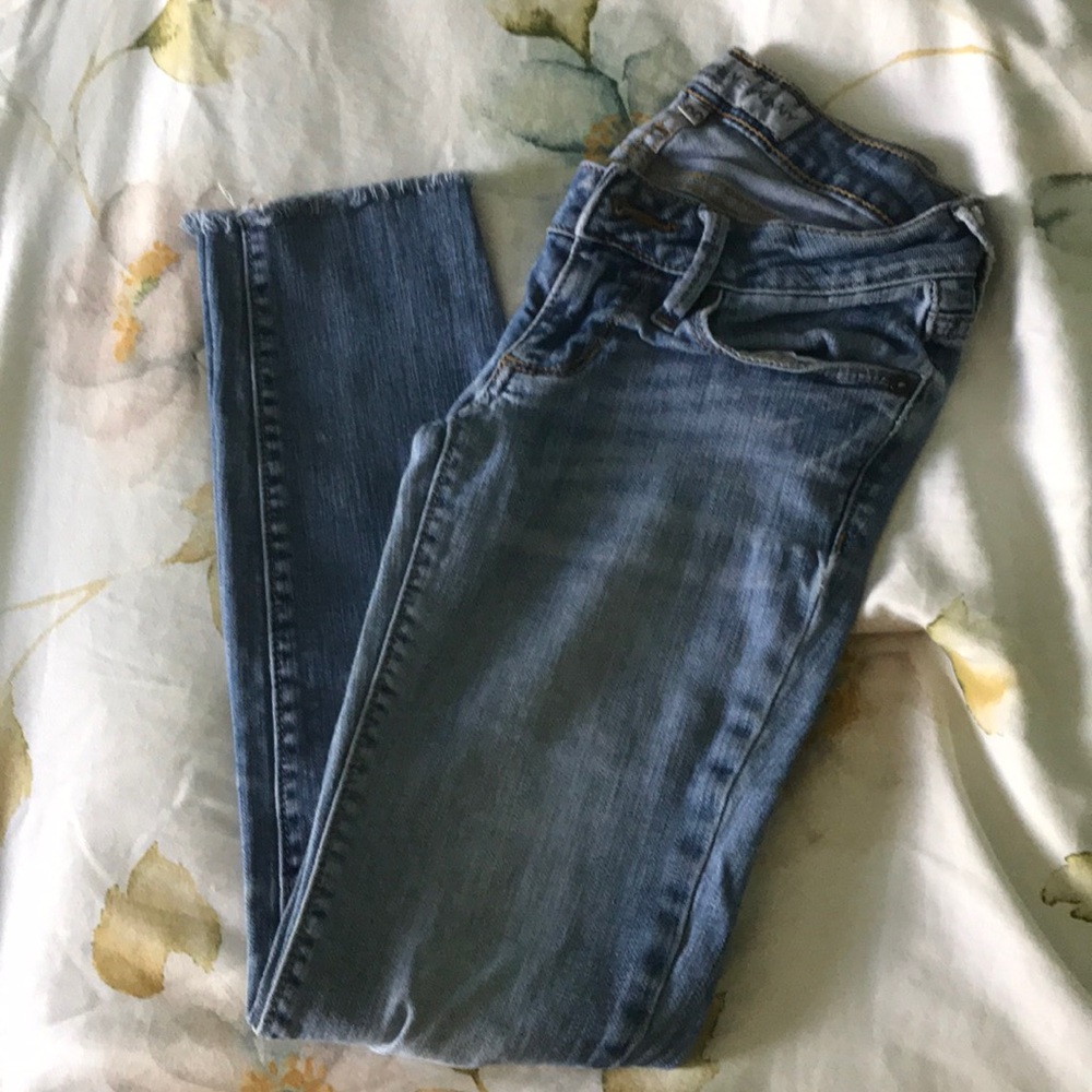 Ripped Knee Skinny Jeans